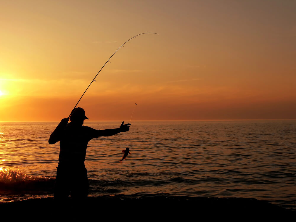 Beach fishing in Texas at sunset